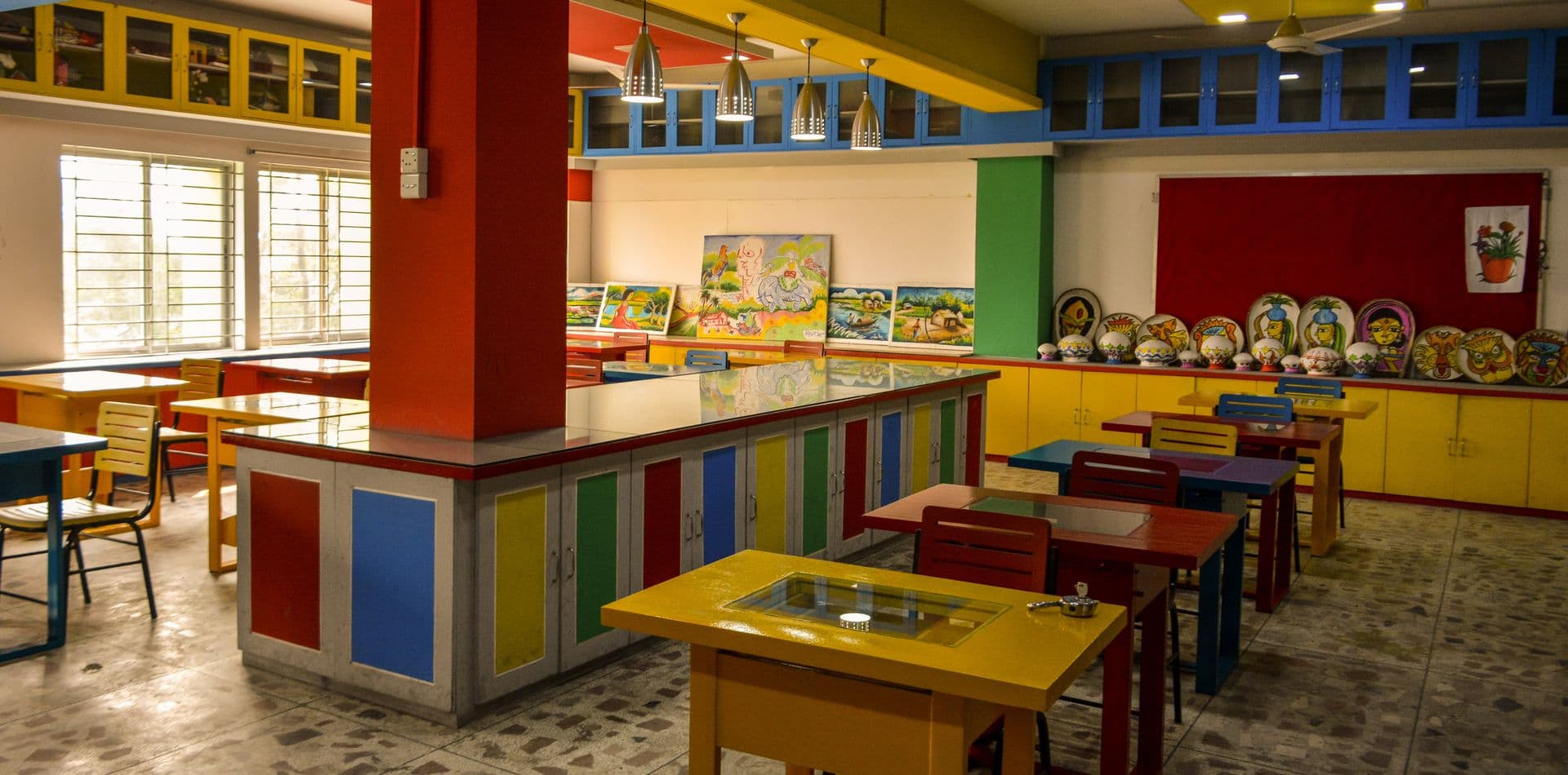 Students actively participating in a music class, playing various instruments