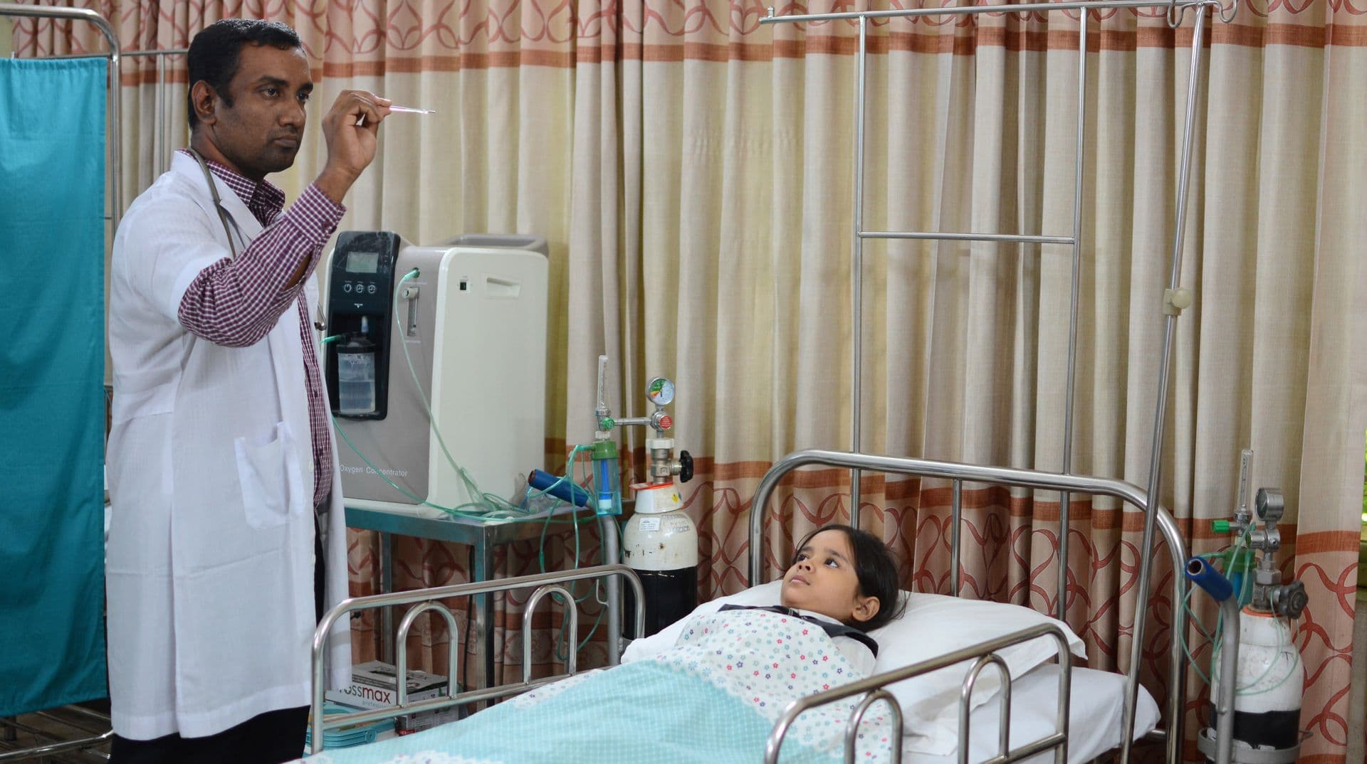 Students actively participating in a music class, playing various instruments